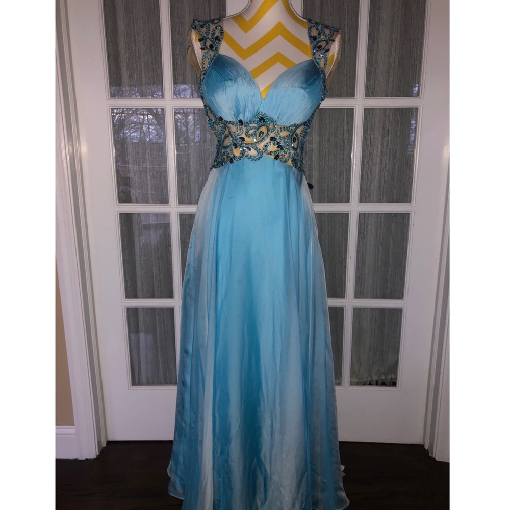 A beautiful Blue prom dress with a open back